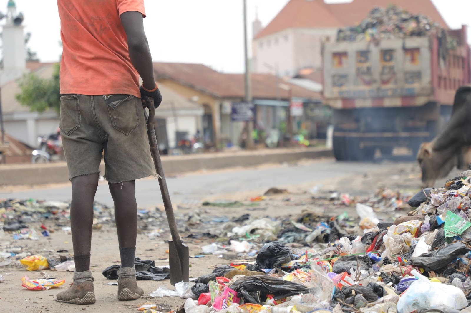 PHOTO STORY: Piles of refuse cover Abuja roads following indiscriminate waste disposal by residents, collectors